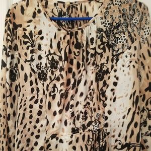 Animal print blouse.